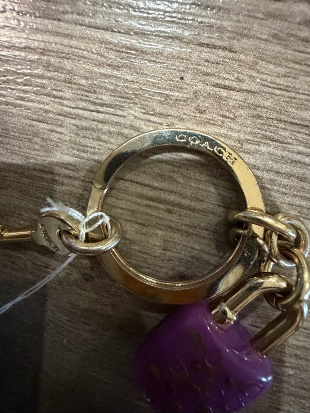 Coach Gold-Tone Keyring with Purple Enamel Padlock Charm and Mini Key - Picture 2 of 5